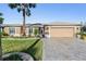 Beautiful two-story home with a two-car garage and attractive landscaping at 10520 Collar Dr, San Antonio, FL 33576