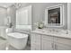 Elegant bathroom with soaking tub, double vanity, and walk-in shower at 2921 Sanchez St, Tampa, FL 33605