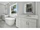 Luxurious bathroom with soaking tub, double vanity, and modern fixtures at 2921 Sanchez St, Tampa, FL 33605