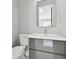 Simple half bathroom with a single vanity and toilet at 2921 Sanchez St, Tampa, FL 33605