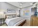 Bright bedroom with a wooden bed frame and artwork at 2921 Sanchez St, Tampa, FL 33605