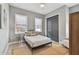 Cozy bedroom with a full-size bed and neutral-colored bedding at 2921 Sanchez St, Tampa, FL 33605