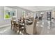 Elegant dining room with a wooden table and neutral-toned chairs at 2921 Sanchez St, Tampa, FL 33605