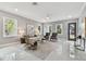 Bright living room features neutral colors, plush seating, and ample natural light at 2921 Sanchez St, Tampa, FL 33605