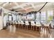 Stylish bar with ample seating, wood floors, and plenty of light at 5902 Yeats Manor Dr, Tampa, FL 33616