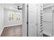 Bedroom adjacent to a closet with an organized shelving system at 5902 Yeats Manor Dr, Tampa, FL 33616