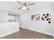 Bright bonus room offers hardwood floors and custom wall accents at 5902 Yeats Manor Dr, Tampa, FL 33616