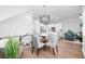 Open-concept dining area connects to the kitchen and a cozy sitting area at 5902 Yeats Manor Dr, Tampa, FL 33616