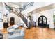 Grand lobby with staircase, tile floors, and elegant decor at 5902 Yeats Manor Dr, Tampa, FL 33616