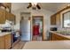 Kitchen with stainless steel appliances and wood cabinets at 1106 Oxbow Rd, Wimauma, FL 33598