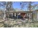Rustic wooden shed with a covered area in need of some repair at 1106 Oxbow Rd, Wimauma, FL 33598
