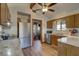 Kitchen with stainless steel appliances and wood cabinets at 1106 Oxbow Rd, Wimauma, FL 33598