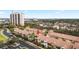 Condo building with tiled roof and private balcony at 5902 Yeats Manor Dr, Tampa, FL 33616