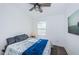 Cozy bedroom with a queen-size bed and a ceiling fan at 2444 Foggy Creek Cir, Clearwater, FL 33764