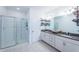 Bathroom with double vanity and large walk-in shower at 2444 Foggy Creek Cir, Clearwater, FL 33764