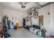 Garage with bikes, storage, and additional space at 2444 Foggy Creek Cir, Clearwater, FL 33764