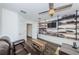 Spacious office with built-in shelving and a comfortable couch at 2444 Foggy Creek Cir, Clearwater, FL 33764