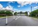 Gated entrance to the community with landscaping at 2444 Foggy Creek Cir, Clearwater, FL 33764