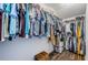 Large walk-in closet with ample shelving and hanging space at 2444 Foggy Creek Cir, Clearwater, FL 33764