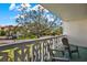 Relaxing balcony with treetop views and comfortable seating at 1012 Pearce Dr # 209, Clearwater, FL 33764