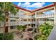 Inviting courtyard with lush landscaping, creating a serene atmosphere at 1012 Pearce Dr # 209, Clearwater, FL 33764