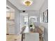 Dining area with kitchen view, wood table and chairs at 1012 Pearce Dr # 209, Clearwater, FL 33764