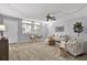 Spacious living room boasts neutral color palette and ample natural light at 1012 Pearce Dr # 209, Clearwater, FL 33764