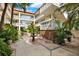 Inviting courtyard with fountain and lush landscaping at 1012 Pearce Dr # 209, Clearwater, FL 33764