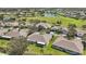 Aerial view of homes and landscape in community at 1232 Corinth Greens Dr, Sun City Center, FL 33573