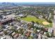 Aerial view of a neighborhood near downtown, featuring tree-lined streets and residential houses at 2921 Sanchez St, Tampa, FL 33605