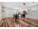 Open concept kitchen boasting modern appliances and wood floors at 1325 W North B St, Tampa, FL 33606