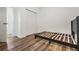 Spacious bedroom with double door closet and wood-look floors at 1325 W North B St, Tampa, FL 33606