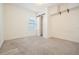 Light and airy bedroom with barn door closet and carpet at 1325 W North B St, Tampa, FL 33606