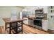 Modern kitchen with stainless steel appliances and butcher block island at 1325 W North B St, Tampa, FL 33606