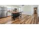 Modern kitchen with butcher block island and wood floors at 1325 W North B St, Tampa, FL 33606