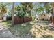 Spacious backyard with wooden fence and lush grass at 1325 W North B St, Tampa, FL 33606