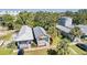 Two-house property with metal roofs, front porches, and ample street parking at 1325 W North B St, Tampa, FL 33606