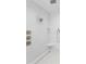 Walk-in shower with marble tile and linear drain at 5104 W Evelyn Dr, Tampa, FL 33609