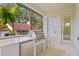 Stainless steel grill and outdoor kitchen with white countertops at 5104 W Evelyn Dr, Tampa, FL 33609