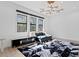Bright living room with a stylish rug and large windows at 5104 W Evelyn Dr, Tampa, FL 33609