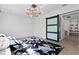 Home office with barn door and herringbone patterned rug at 5104 W Evelyn Dr, Tampa, FL 33609