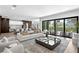Open concept living room and kitchen with stylish decor at 5104 W Evelyn Dr, Tampa, FL 33609