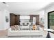 Living room with white sofa and view into kitchen area at 5104 W Evelyn Dr, Tampa, FL 33609