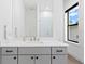 Clean bathroom with a quartz countertop and modern vanity at 5104 W Evelyn Dr, Tampa, FL 33609