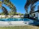 Refreshing pool with patio furniture and lush landscaping at 6315 35Th N Ave, St Petersburg, FL 33710