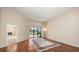 Bright living room, hardwood floors, fireplace view at 4944 Silverthorne Ct, Oldsmar, FL 34677