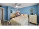 Light and airy bedroom with a queen-size bed and ample closet space at 2750 E Bay Dr # 5F, Largo, FL 33771