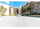 Two-story building with parking and landscaping at 90 S Highland Ave # 1115, Tarpon Springs, FL 34689