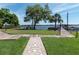 Community boardwalk with water access and seating at 90 S Highland Ave # 1115, Tarpon Springs, FL 34689