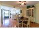 Open concept dining area with view into kitchen and living areas at 90 S Highland Ave # 1115, Tarpon Springs, FL 34689